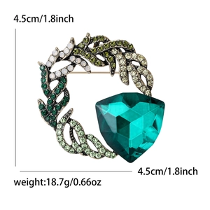 Vintage green crystal wreath brooch for women with leaf design and sparkling rhinestones