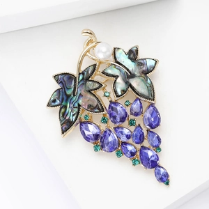 Elegant grape brooch with purple crystals, abalone shell leaves, and pearl on gold base