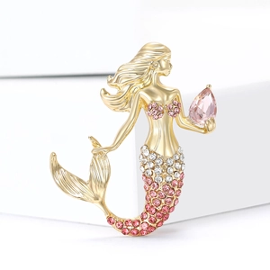 Fonkelende zeemeermin broche met roze strasstenen en peerkristal op gouden basis