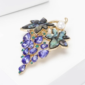 Elegant grape brooch with purple crystals, abalone shell leaves and pearl on gold base