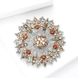 Detailed view of luxury hollow crystal floral brooch with amber and AB rhinestones