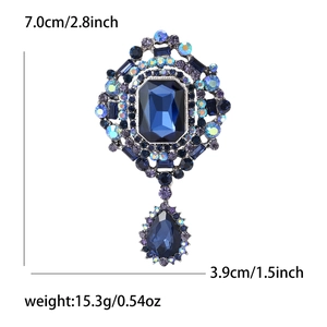 Blue crystal brooch with dimensions 7.0cm x 3.9cm and weight 15.3g shown in detail