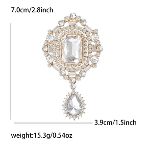 Detailed size view of retro crystal brooch with teardrop pendant and gold frame