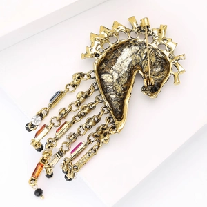 Vintage gold horse head brooch with colorful rhinestones and elegant long tassels