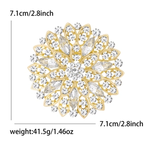 Spilla a girasole dorata con strass e informazione sulle dimensioni di 7,1 cm