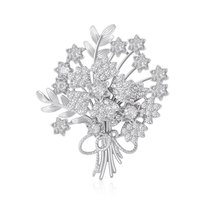 Luxurious silver bouquet brooch with sparkling zircon crystals and a ribbon bow accent