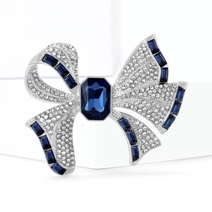 Elegant silver bow brooch with rectangle blue gemstone and white crystal inlay