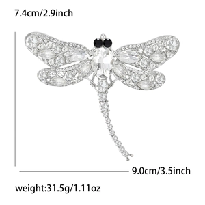 Detailed view of rhinestone dragonfly brooch with precise size and weight measurements