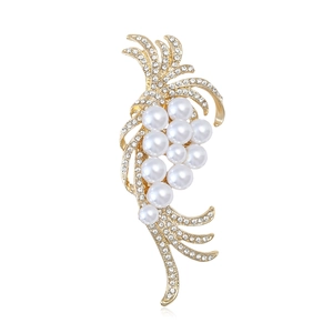 Elegant gold-tone brooch featuring minimalist stream-lined pearl cluster with tiny crystals