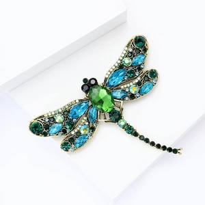 Exquisite dragonfly brooch with emerald crystals and blue rhinestones on gold alloy base