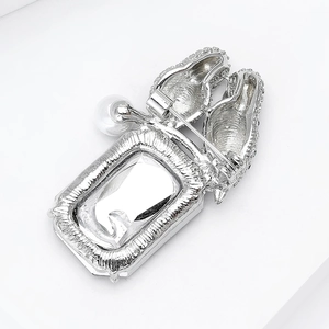 Elegant silver parrot brooch with large rectangular zircon and pearl detail for suits