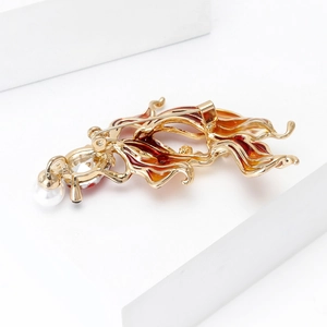 Elegant gold-tone goldfish brooch with red enamel gradient, pearl, and rhinestone accents