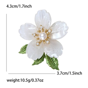 Detail view of flower brooch showing 4.3cm x 3.7cm size and 10.5g weight specifications