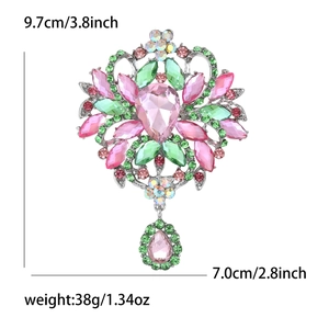 Dimensions détaillées de la broche vintage en cristal avec gemmes roses et vertes