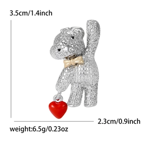 Size chart for rhinestone bear brooch with red heart charm measuring 3.5cm by 2.3cm