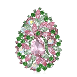 Broche élégante en cristal avec gemme rose en poire et strass verts sur monture argentée
