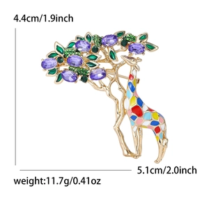 Colorful enamel giraffe and tree brooch with purple stones and green crystals