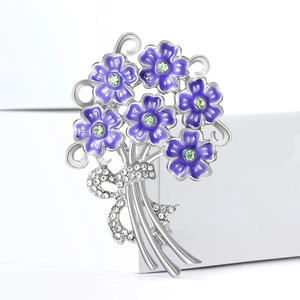Close-up of elegant purple enamel hydrangea brooch with sparkling crystal floral accents