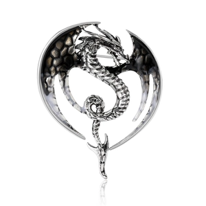 Gothic style silver flying dragon brooch with black and white enamel wings detail