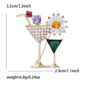 Elegant cocktail glass brooch with colorful crystals and rhinestones in a gold plating
