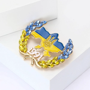 Detail of Ukraine map brooch with blue yellow enamel and sparkling rhinestones