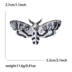 Vintage death's head moth brooch in silver alloy, measuring 5.3cm x 2.7cm and weighing 11.6g