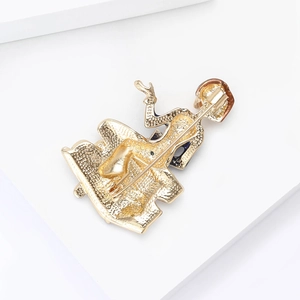 Detailed back view of a gold plated female teacher brooch showing the secure pin fastener