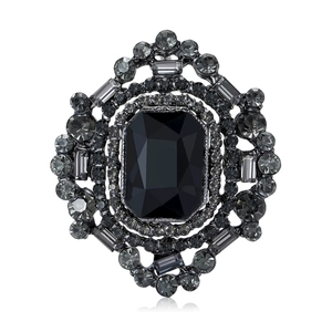 Broche vintage de luxe avec pierre noire et strass scintillants en finition bronze noir