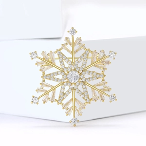 Exquisite gold snowflake brooch with sparkling zircon center and micro-paved crystals