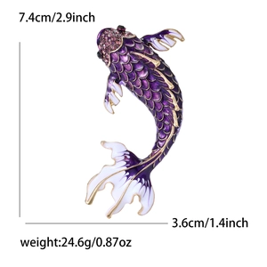 Detailed size view of an enamel koi fish brooch with purple crystals and gold accents