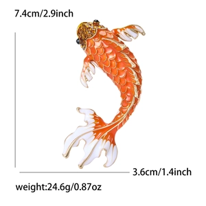 Detailed view of red koi fish brooch with dimensions 7.4cm x 3.6cm and enamel finish