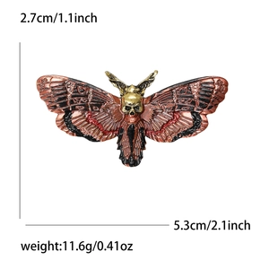 Gothic moth brooch with skull detail in deep red and black enamel coating