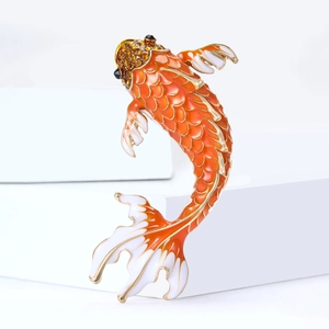 Elegant enamel koi fish brooch with vibrant orange scales and sparkling rhinestones