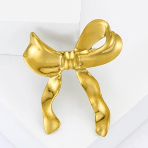Broche nœud en alliage doré poli avec texture métallique élégante pour mode féminine