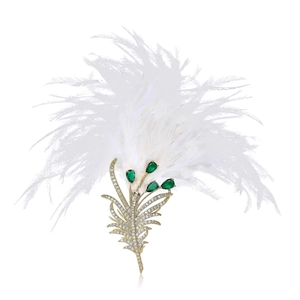 Luxurious feather brooch with gold copper base, white zircons and pear-shaped green gems