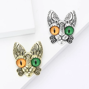Steampunk cat head brooch with geometric engraving and vibrant heterochromia eyes