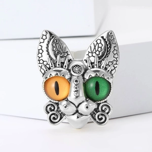 Vintage silver cat head ring with engraved moon patterns and colorful gemstone eyes