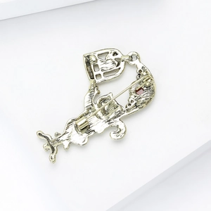 Detailed back view of vintage gold cat brooch showing the secure metal pin fastener