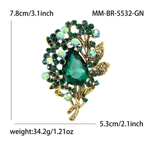 Large vintage emerald crystal flower brooch with gold plating and size measurements
