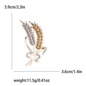 Elegant gold wheat brooch with blue crystals and a white pearl accent for women