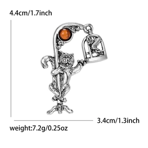 Vintage cat brooch with rhinestone and birdcage pendant, silver-tone alloy, 4.4cm size