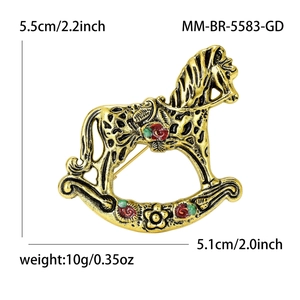 Retro rocking horse brooch with enamel flower patterns in vintage gold alloy finish
