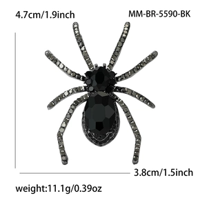 Detail view of vintage black rhinestone spider brooch showing 4.7cm x 3.8cm dimensions