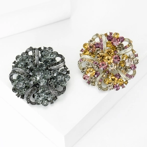 Vintage floral wreath brooch with sparkling glass rhinestones for elegant formal wear