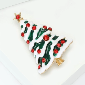 Green and white enamel Christmas tree brooch with red rhinestones and gold star pin