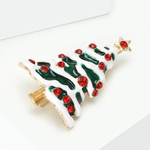 Golden Christmas tree brooch with green enamel, red rhinestones and a gold star