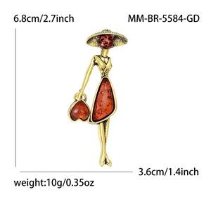 Vintage retro gold metal fashion lady brooch with amber resin inlay for elegant dress suits