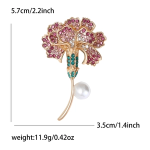 Elegant carnation flower brooch with pink rhinestones and a pearl on a golden base