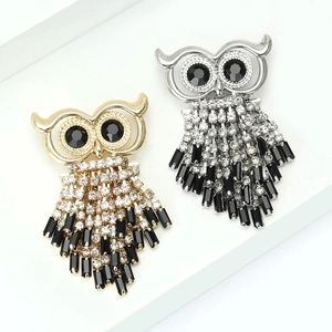 Fashionable owl brooch with copper tassels and sparkling zircon stones in gold and silver