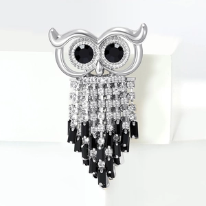 Fashionable copper owl brooch with tassel fringe and sparkling black crystal eyes